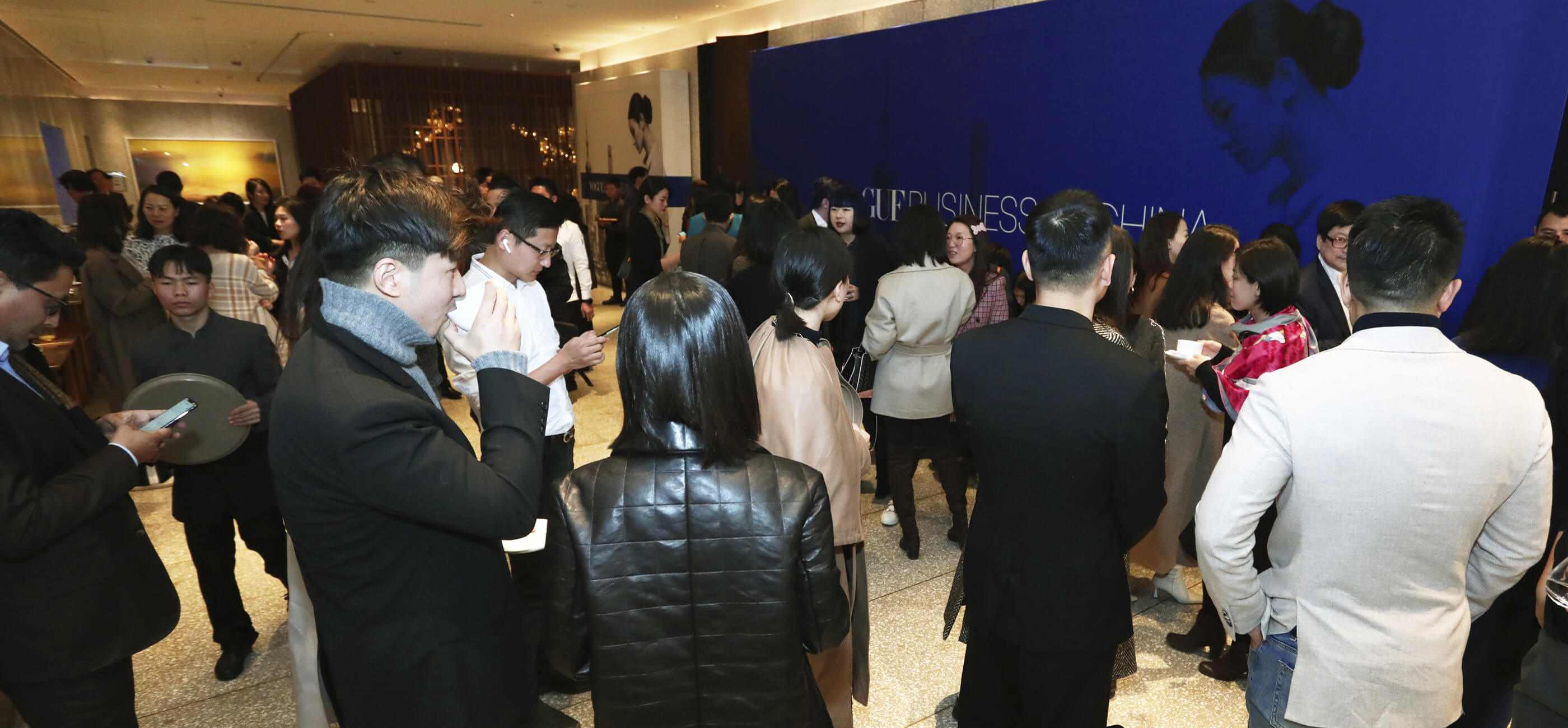 This image may contain: vogue business,  photograph, digital, vogue business in china, people, event, gathering, networking